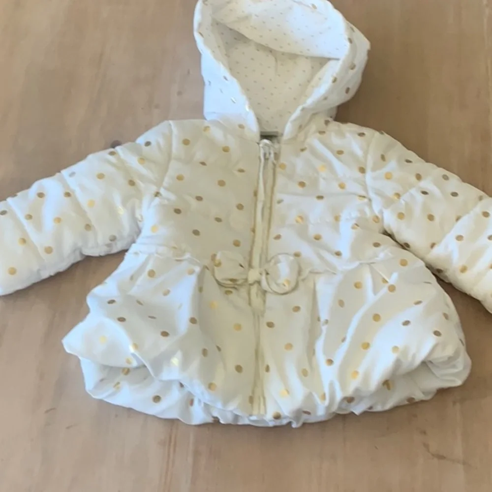 White Jackets with gold circles. Puffy. Like new. size = 12 months